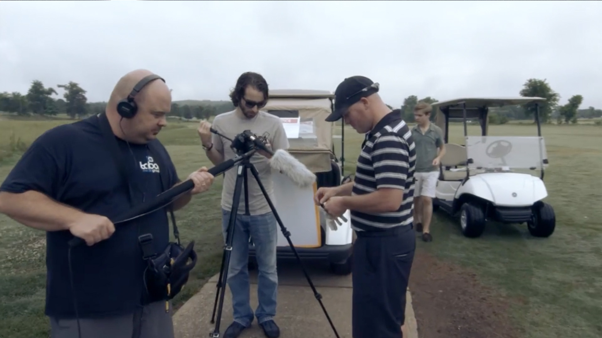 Chris leading a video production on a golf course in 2014